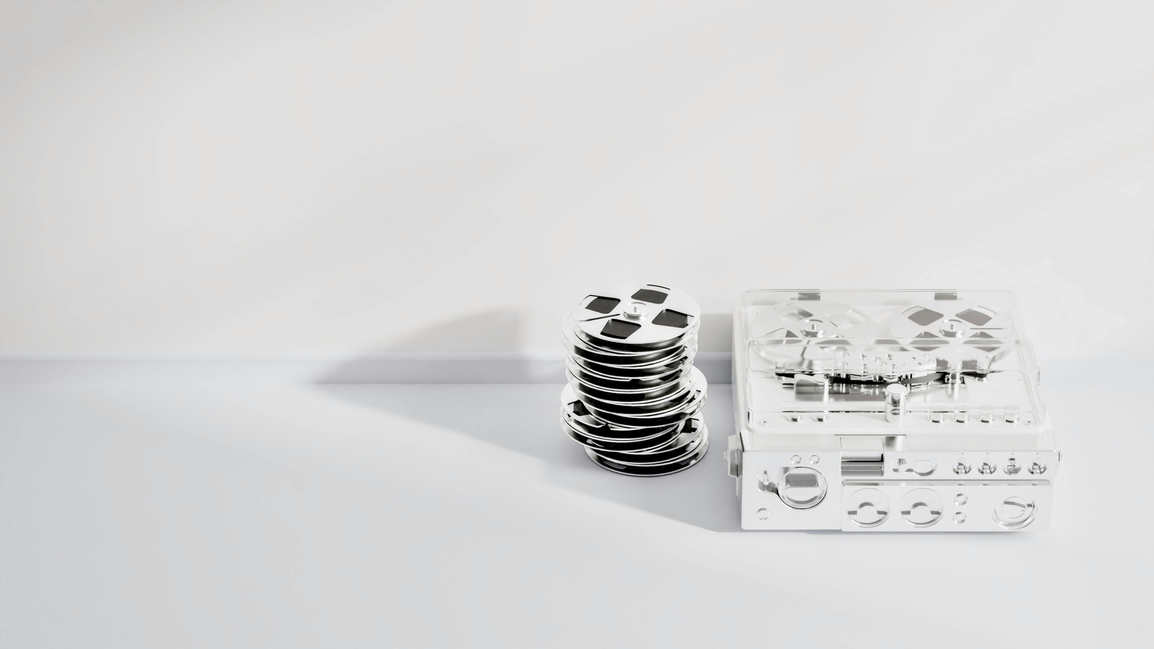 a stack of plates and cups on a white surface