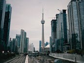 A view of the cn tower from a train