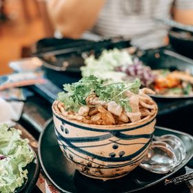 Noodle soup bowl on a dark table — photo by Vicky Tran on Pexels