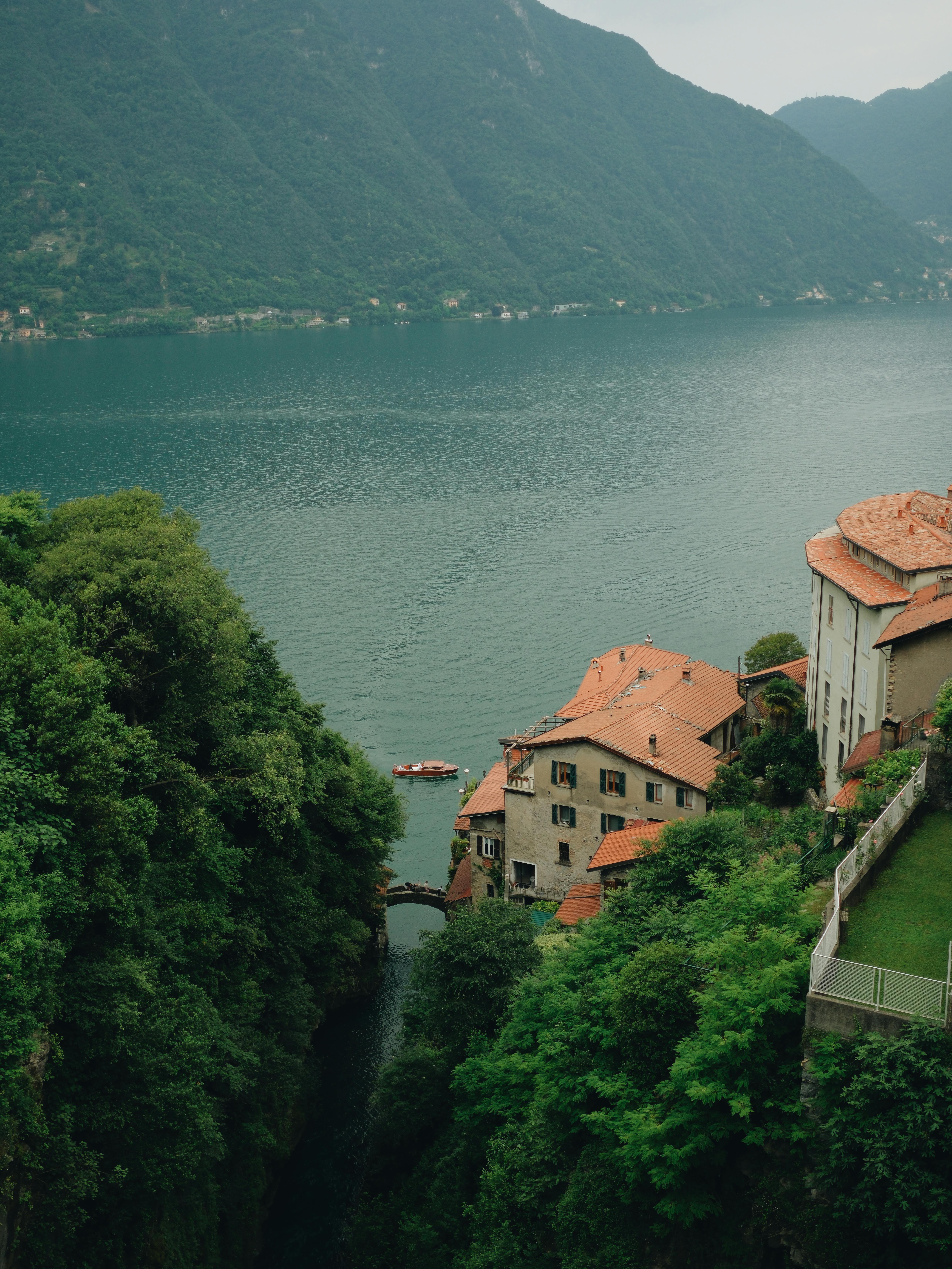 a view of a small village on the side of a mountain