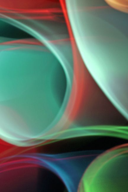 Dynamic blend of vibrant colors and flowing curves in an abstract style, ideal for modern art enthusiasts.