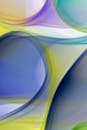 A colorful abstract background with a blue, green and yellow swirl