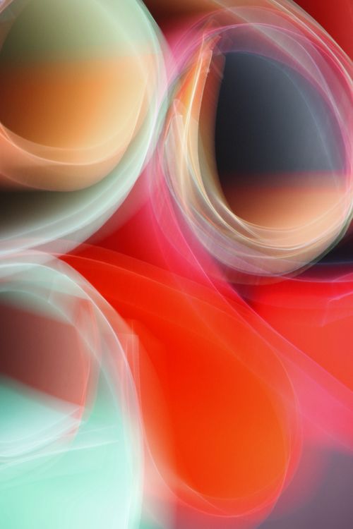 Free Vibrant abstract design capturing dynamic light streaks in vivid colors, offering a surreal visual experience. Stock Photo