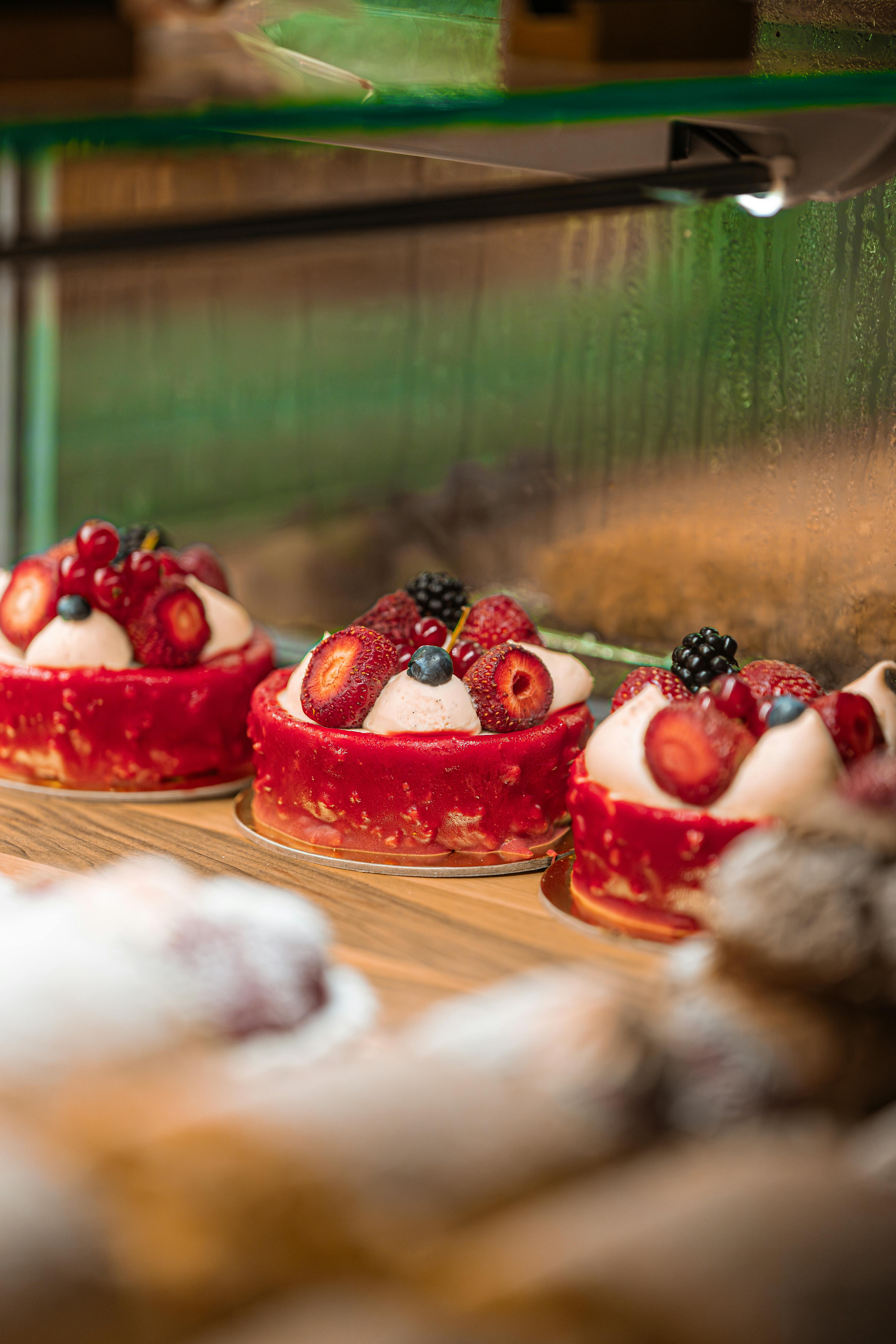 a display case with several desserts on it