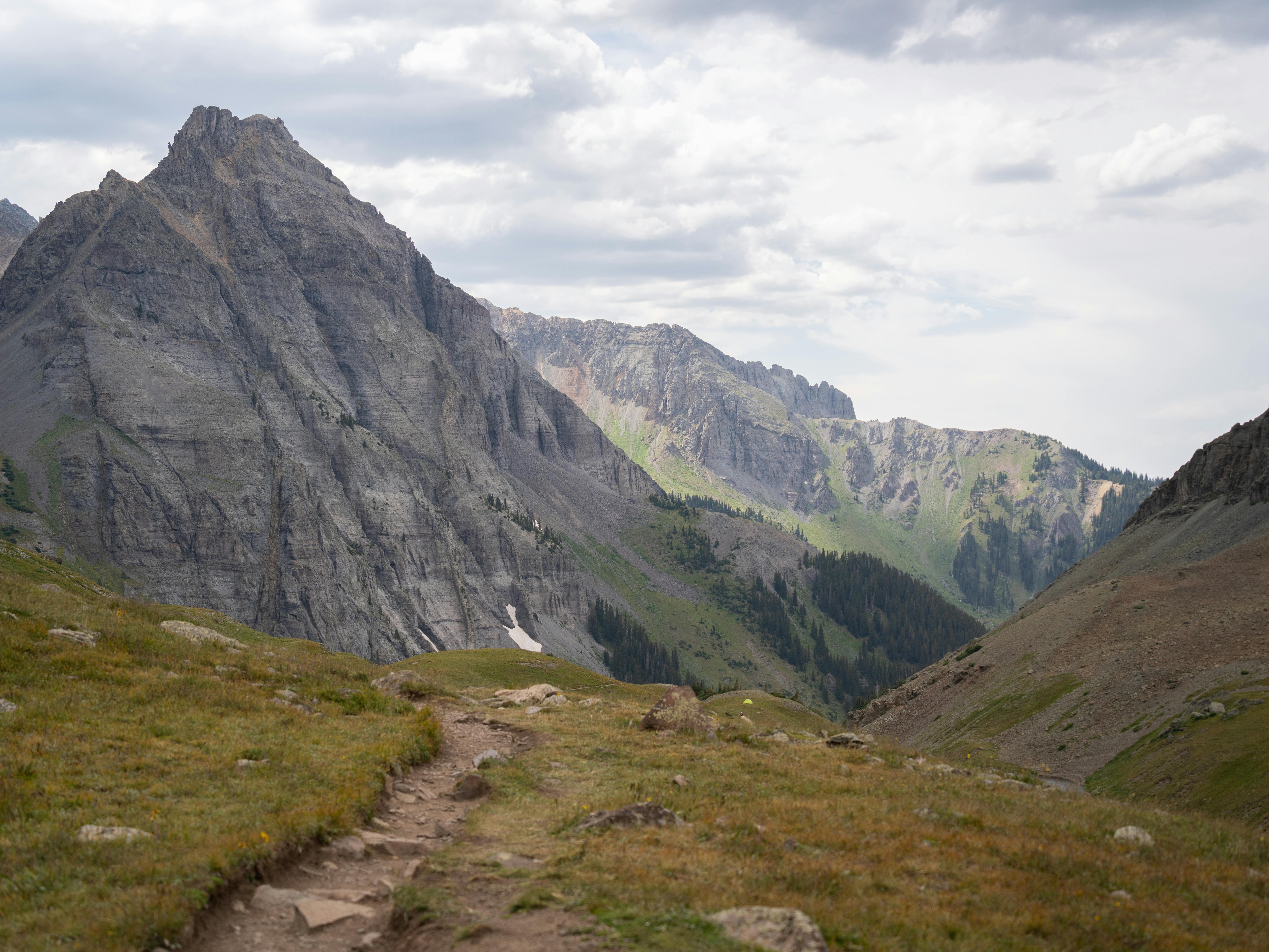 Explore the rugged beauty of the San Juan Range with this scenic mountain trail ideal for hiking and adventure.