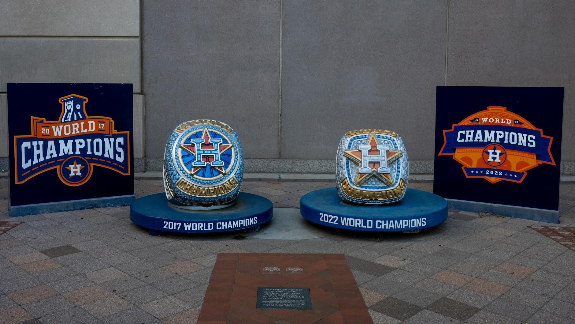Unlock the Secrets: 7 Must-Have Fan Merchandise to Elevate Your Collection 9 https://www.pexels.com/photo/two-championship-rings-are-displayed-on-a-sidewalk-27825057/