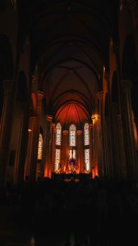Stunning view of St. Anthony of Padua Church in Istanbul with illuminated stained glass and Gothic architecture.