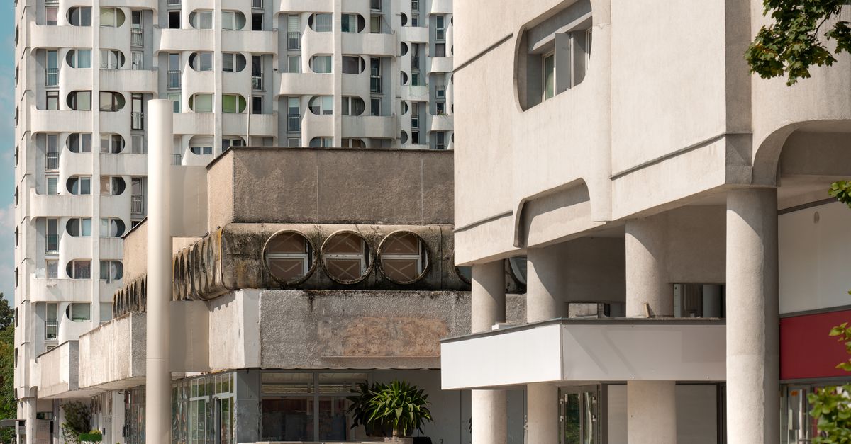 Explore the futuristic design of a residential building in Wrocław's urban landscape.
