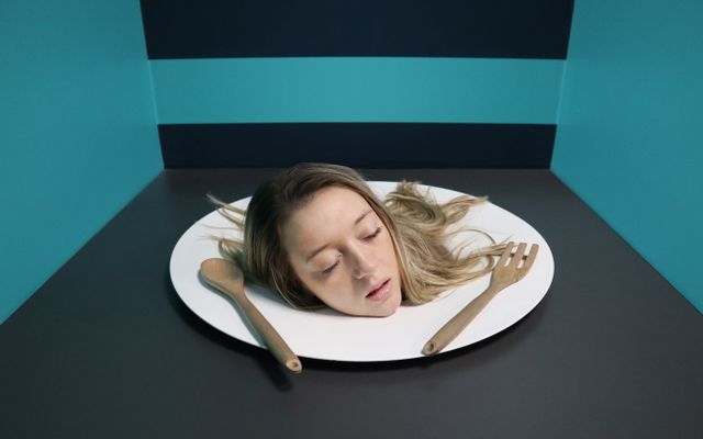 Photo: Designecologist on Pexels Surreal head on a plate exhibit in Toronto's Museum of Illusions.