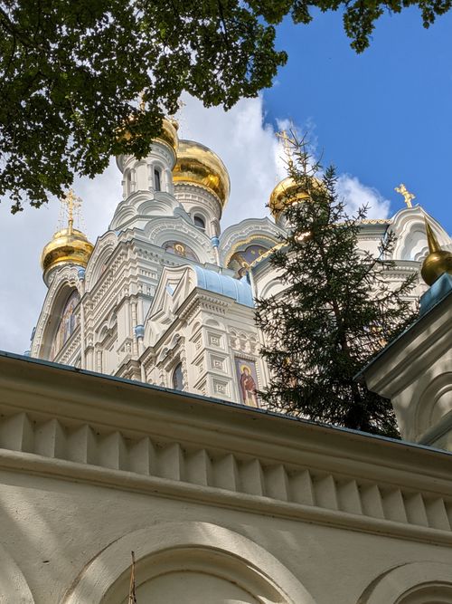 Free Majestic Orthodox church in Karlovy Vary with golden domes, rich cultural and architectural heritage. Stock Photo
