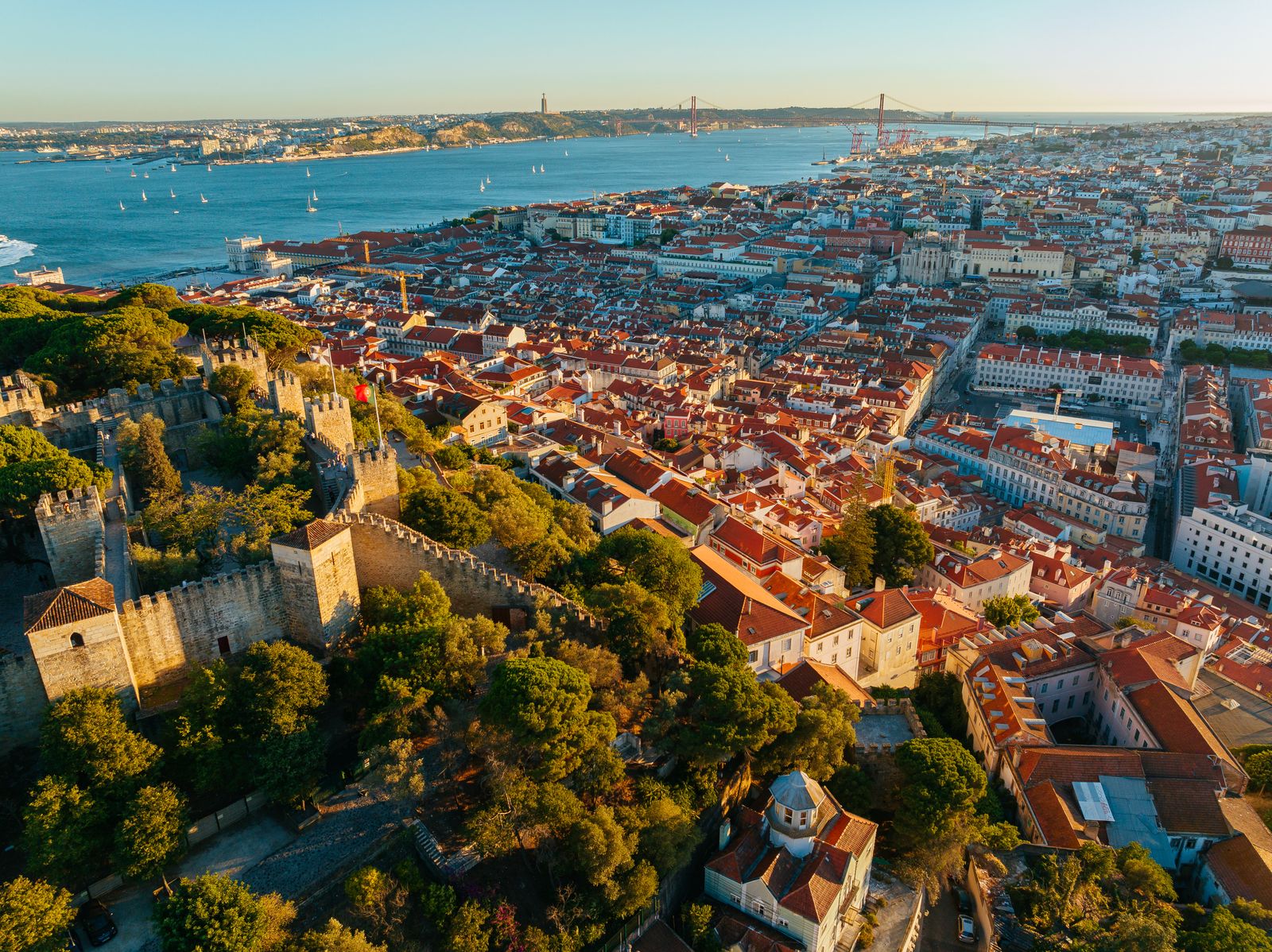 Lisbon aerial view Portuguese flag castle Tagus river