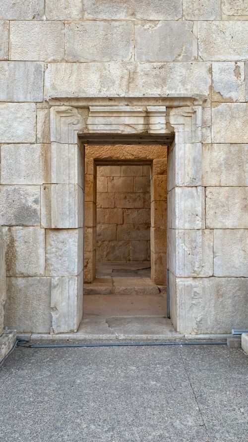 Free Explore the intricate design of an ancient stone doorway showcasing historic architectural beauty. Stock Photo