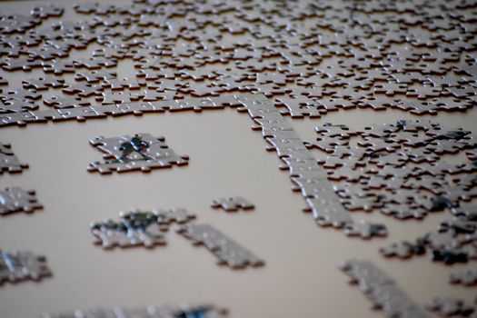 jigsaw puzzle pieces arranged on a table