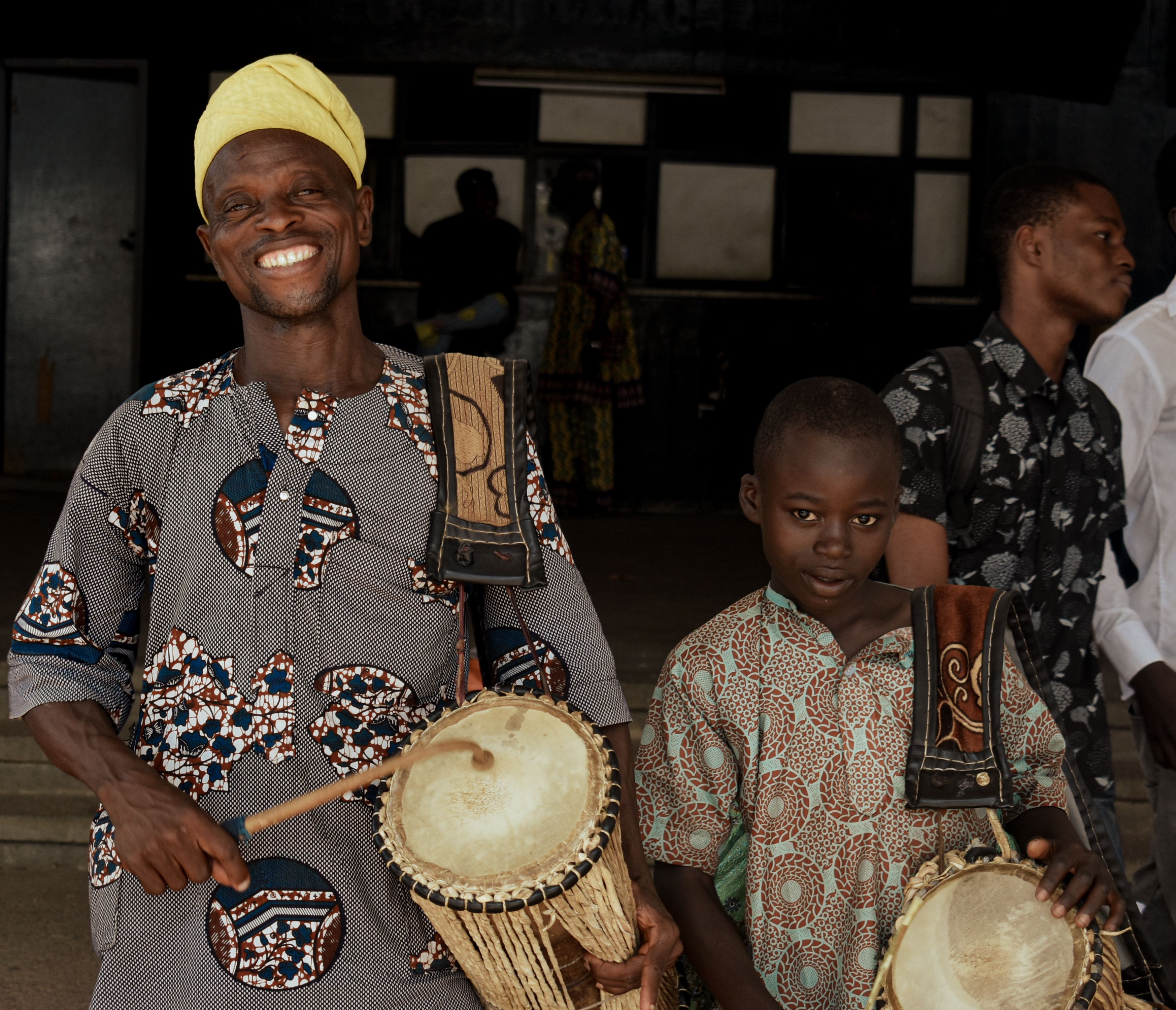Generations in Harmony: A seasoned drummer and his young son share a ...