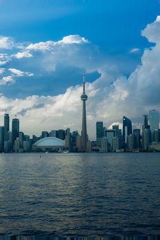 Captivating view of Toronto's skyline featuring the CN Tower over Lake Ontario's waters.