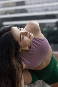 Woman practicing a yoga pose outdoors in Ciudad de México.