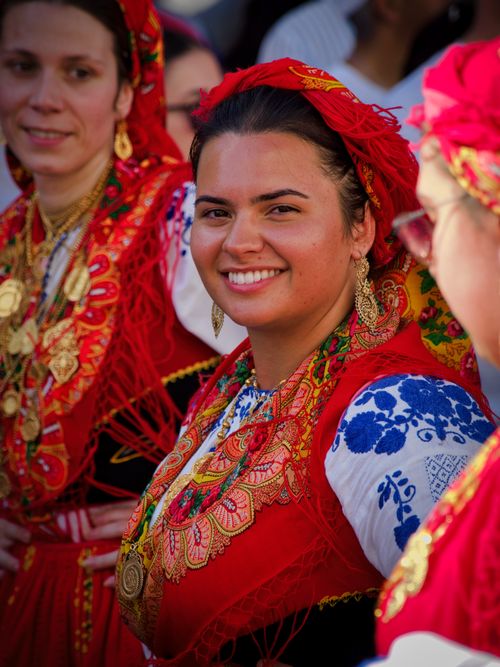 Free Beautiful cultural celebration with women in vibrant traditional costumes, featuring intricate embroidery. Stock Photo