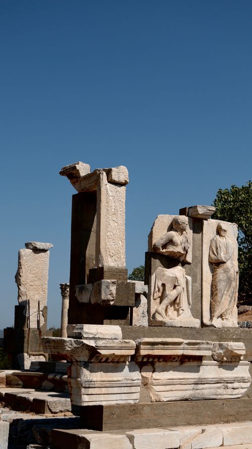 Free Ancient stone ruins of a temple in Ephesus, İzmir, Türkiye under a clear blue sky. Stock Photo