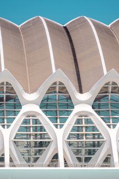 Close-up view of modern architectural details in Valencia, Spain, under a clear blue sky.