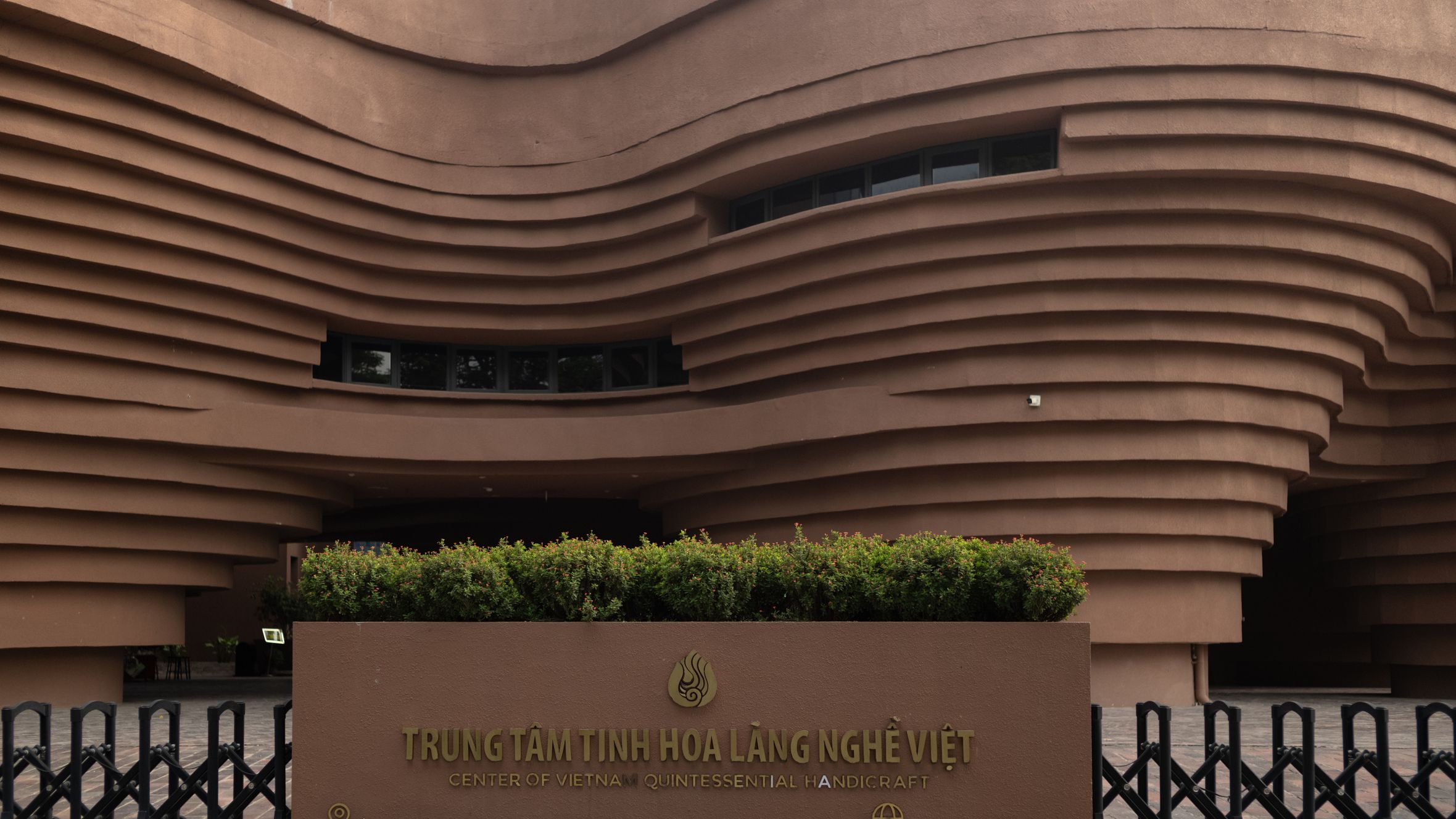 The Center of Vietnam Quintessential Handicraft showcases modern architectural design with wave-like patterns.