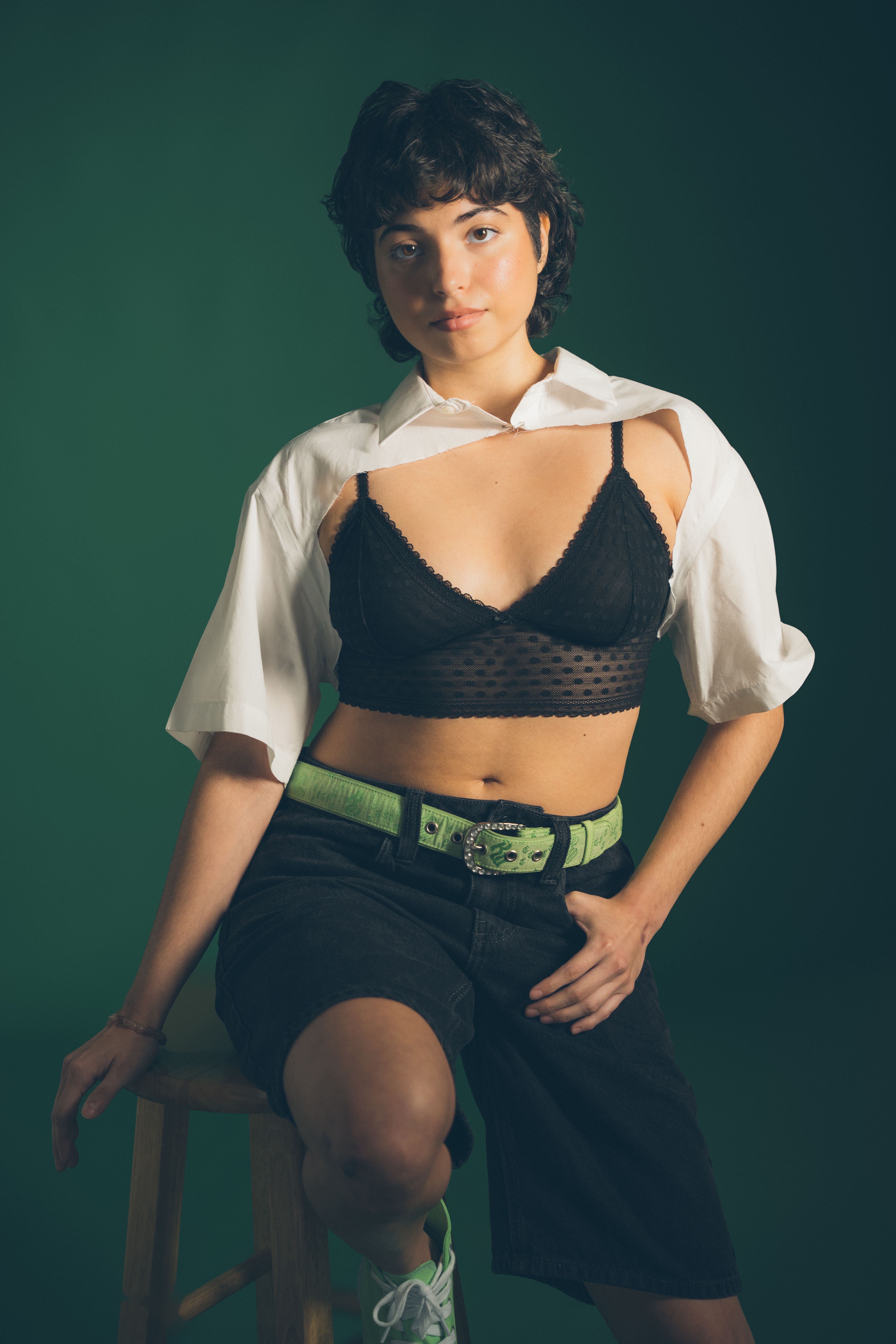 woman wearing mesh top over bralette going out outfit