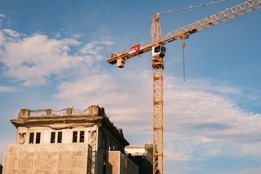 Construction site with a crane against the sky in Istanbul, Turkey. Modern urban development.
