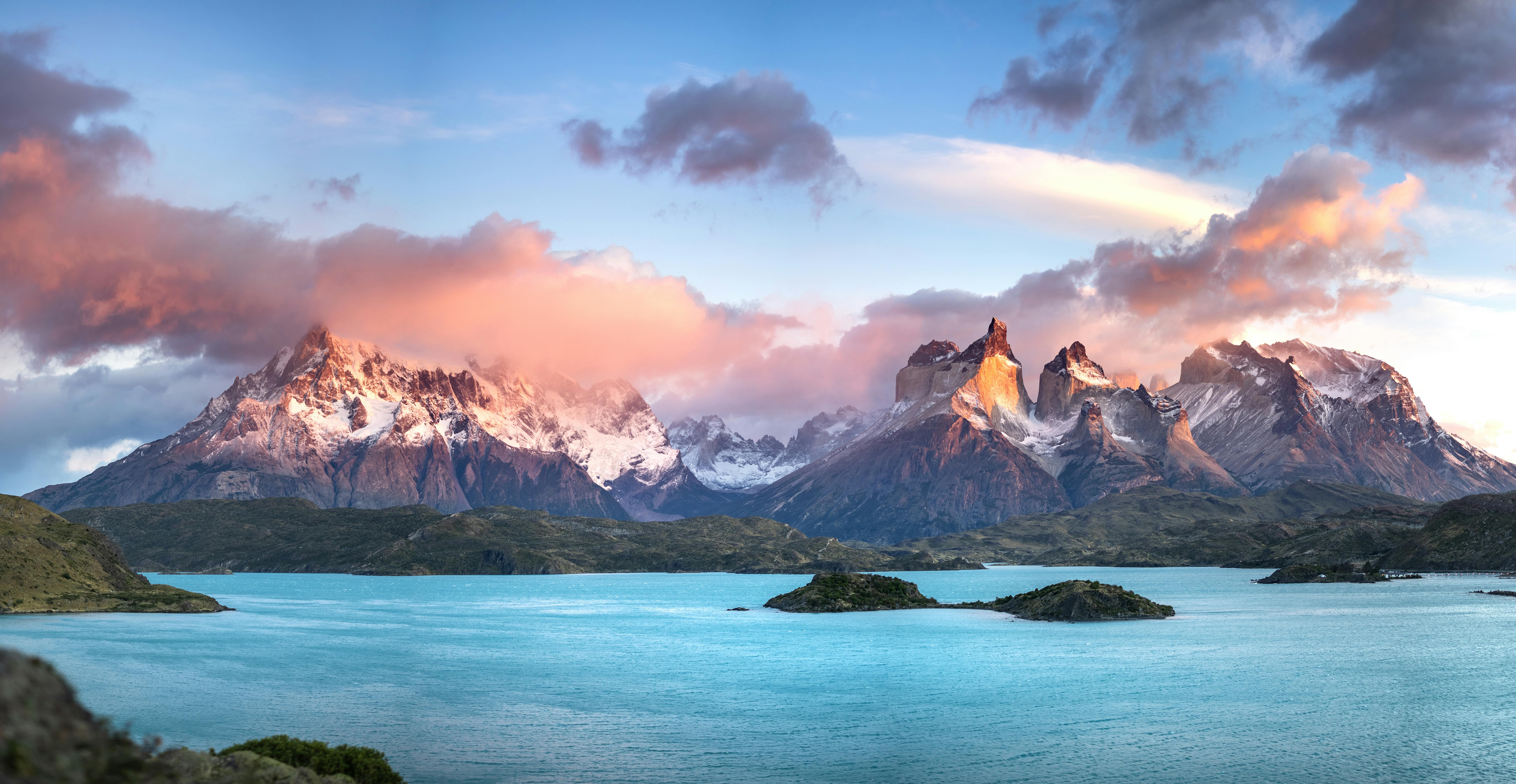 the mountains and water in the background of a landscape