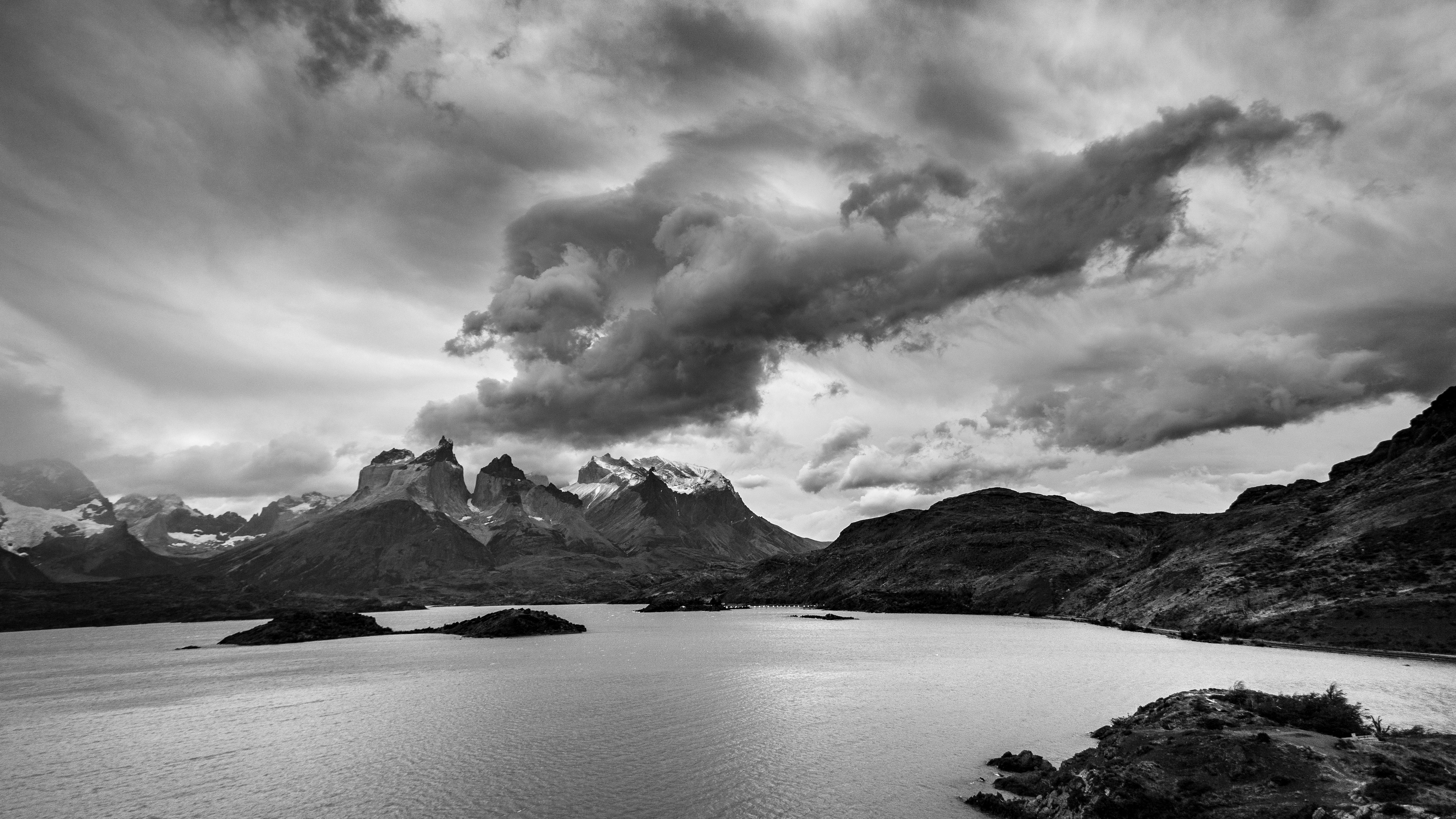 Black and white photograph of a lake and mountains · Free Stock Photo