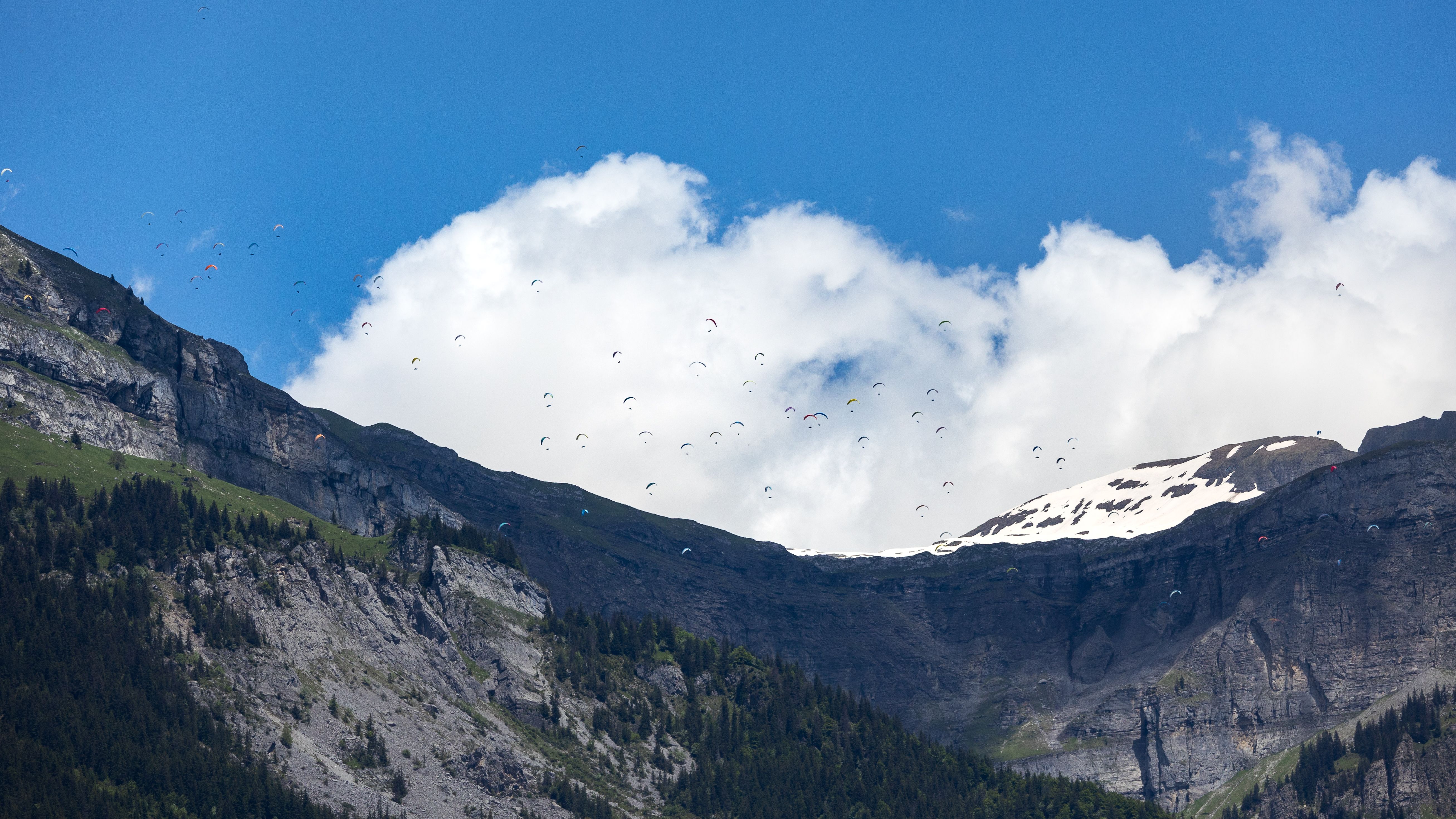 A mountain with a blue sky and clouds · Free Stock Photo