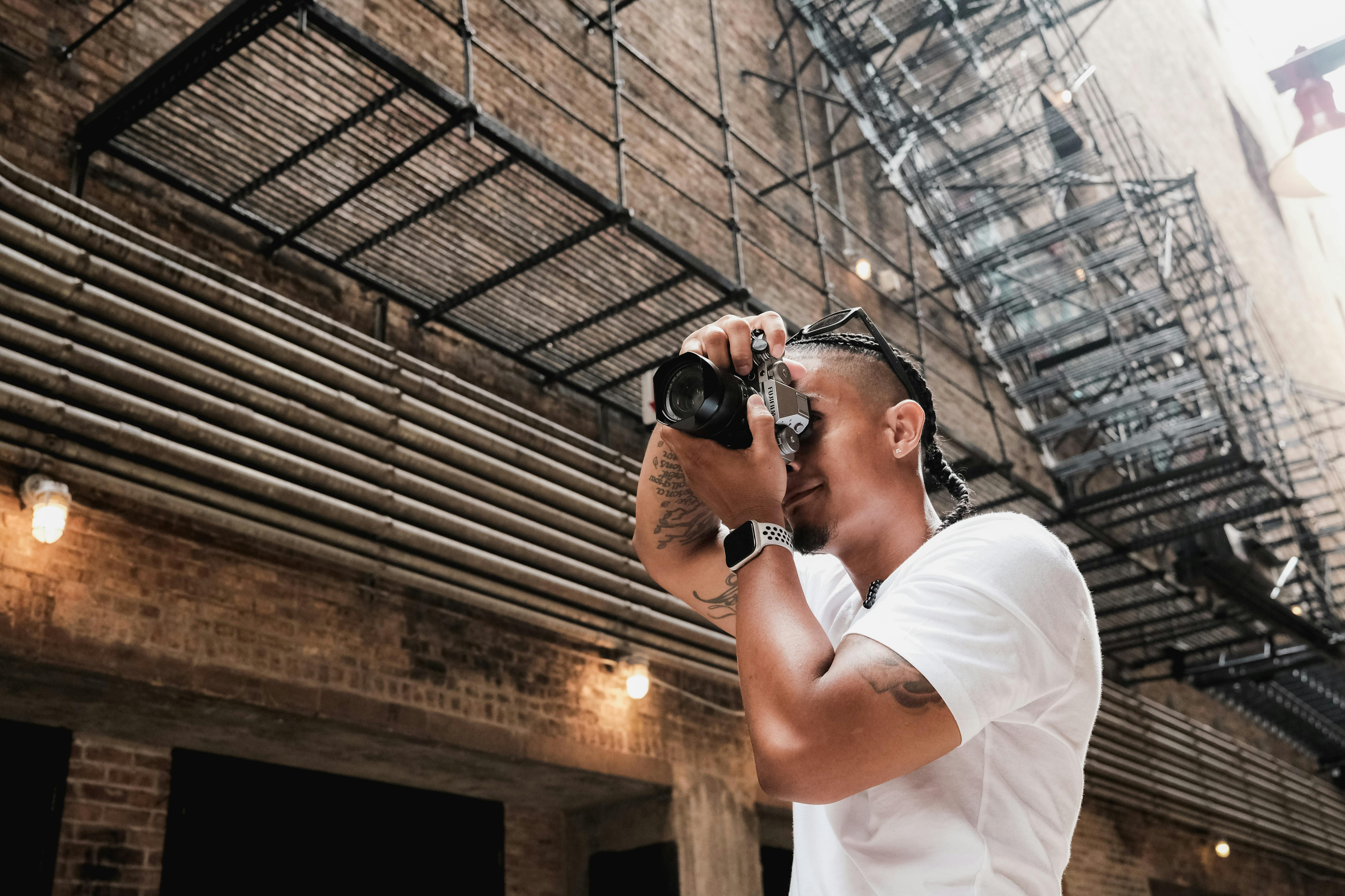 a man taking a picture of a building