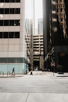 A vibrant view of downtown Chicago's modern architecture with reflections and urban life.