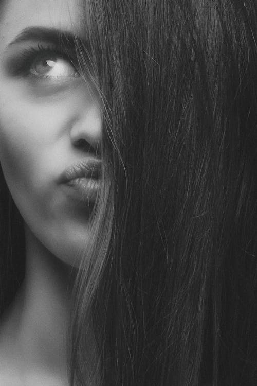 Monochrome Photo Of Woman Pouting Lips