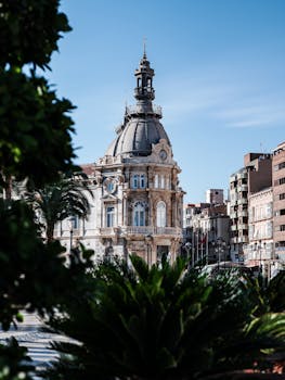Stunning view of historic architecture in Cartagena, Spain, showcasing a beautiful dome.