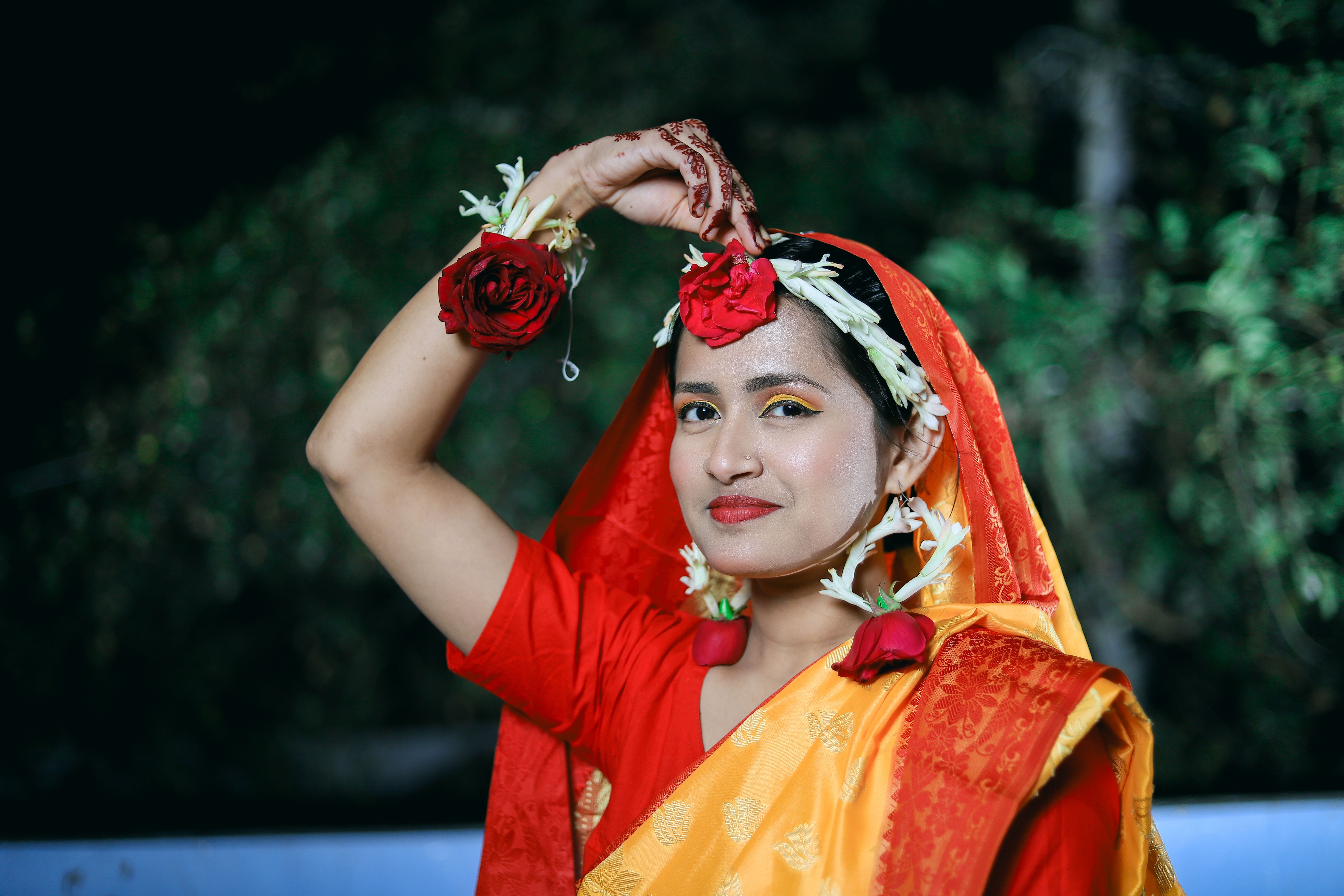 Young Indian woman in traditional bright sari · Free Stock Photo