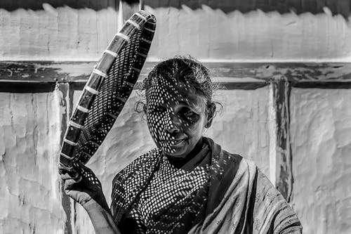 Woman Holding Woven Basket