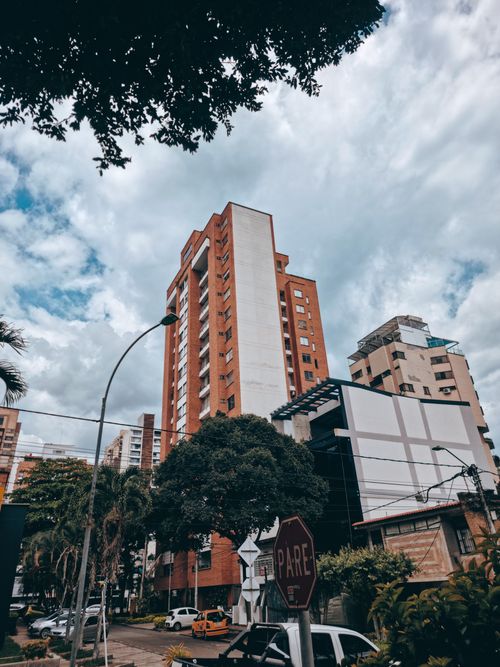 Free Modern apartment buildings in Bucaramanga, Colombia, under a cloudy sky. Stock Photo