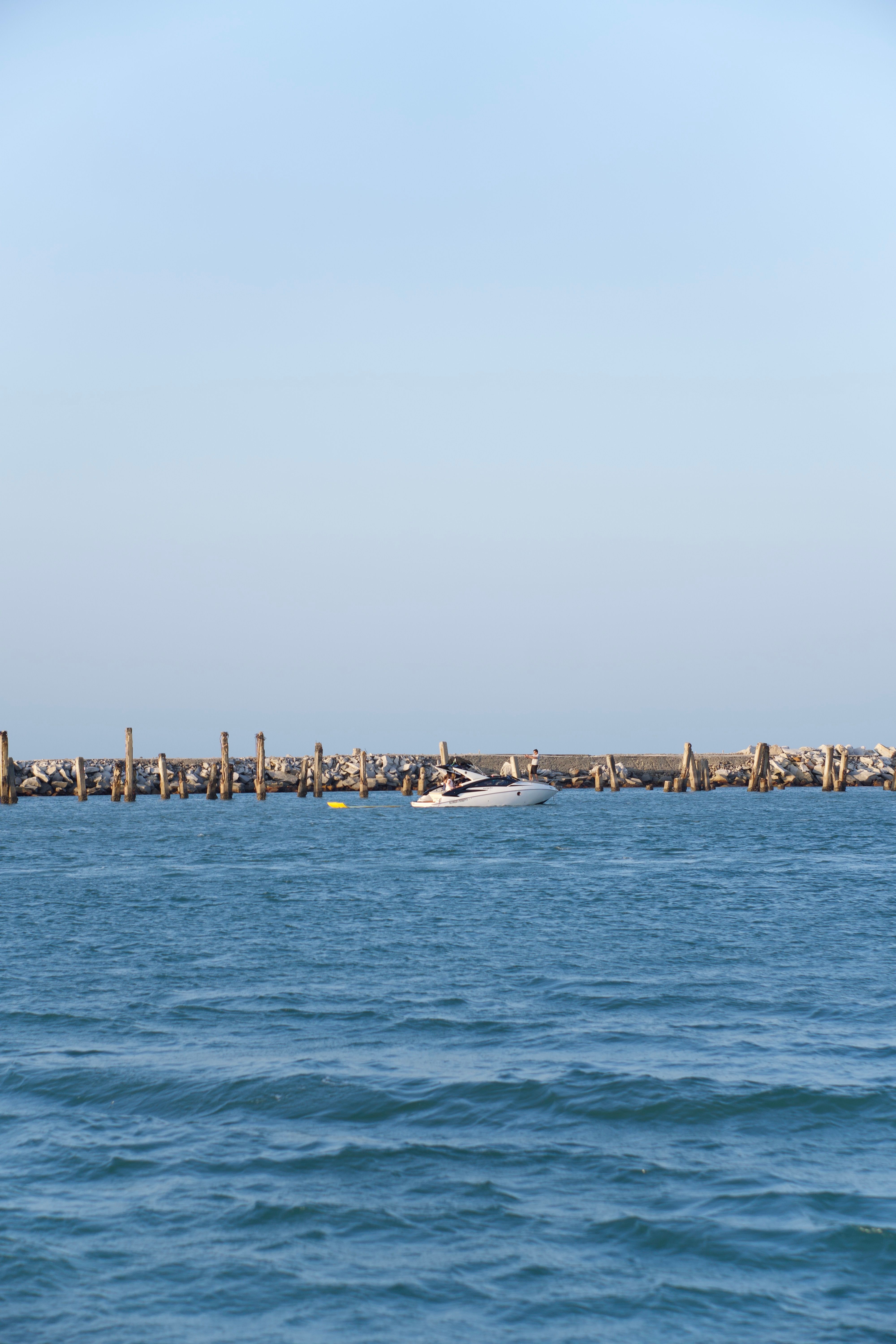 Birds Eye View of Sunlit Pier · Free Stock Photo