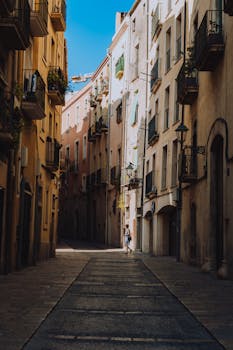 Explore the charming ancient streets of Tarragona with cobblestones and historic architecture.