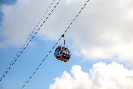 Scenic cable car journey with blue skies and clouds in Tay Ninh, Vietnam.