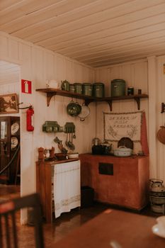 Warm vintage kitchen with antique decor and rustic elements.