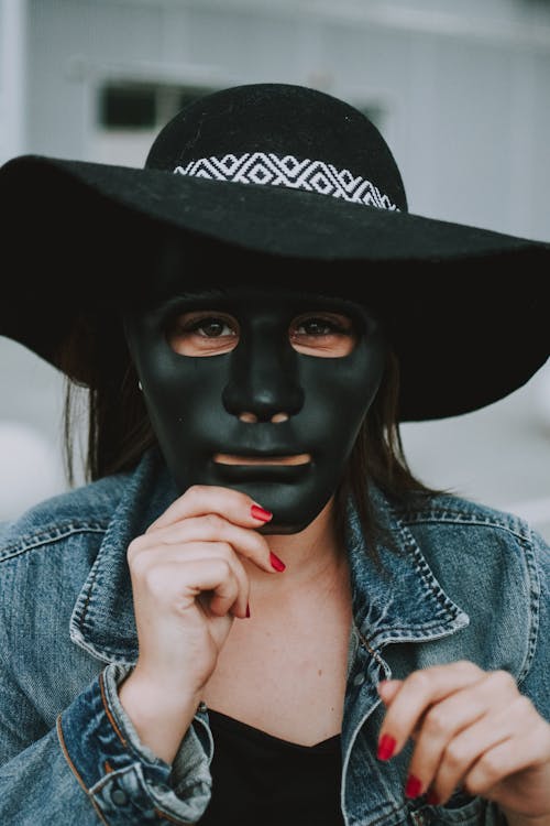 Free Person Wearing Black Mask Stock Photo