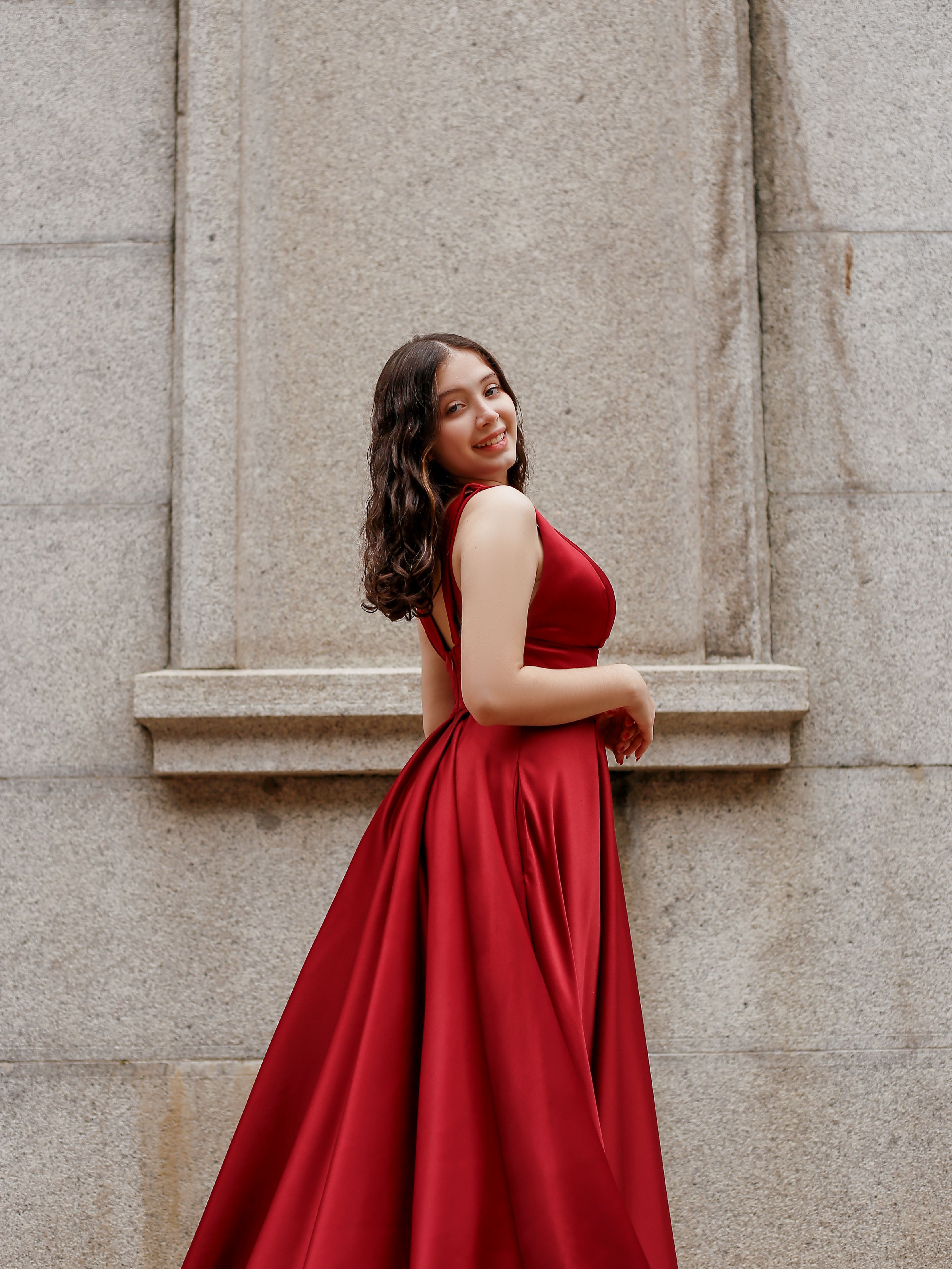 A woman in a red dress posing for a photo · Free Stock Photo