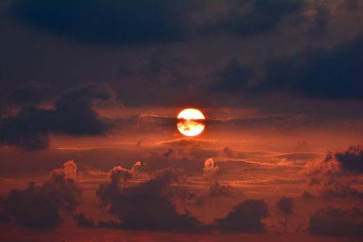 Beautiful sunset with dramatic clouds over Batroun, Lebanon, creating a vibrant sky.