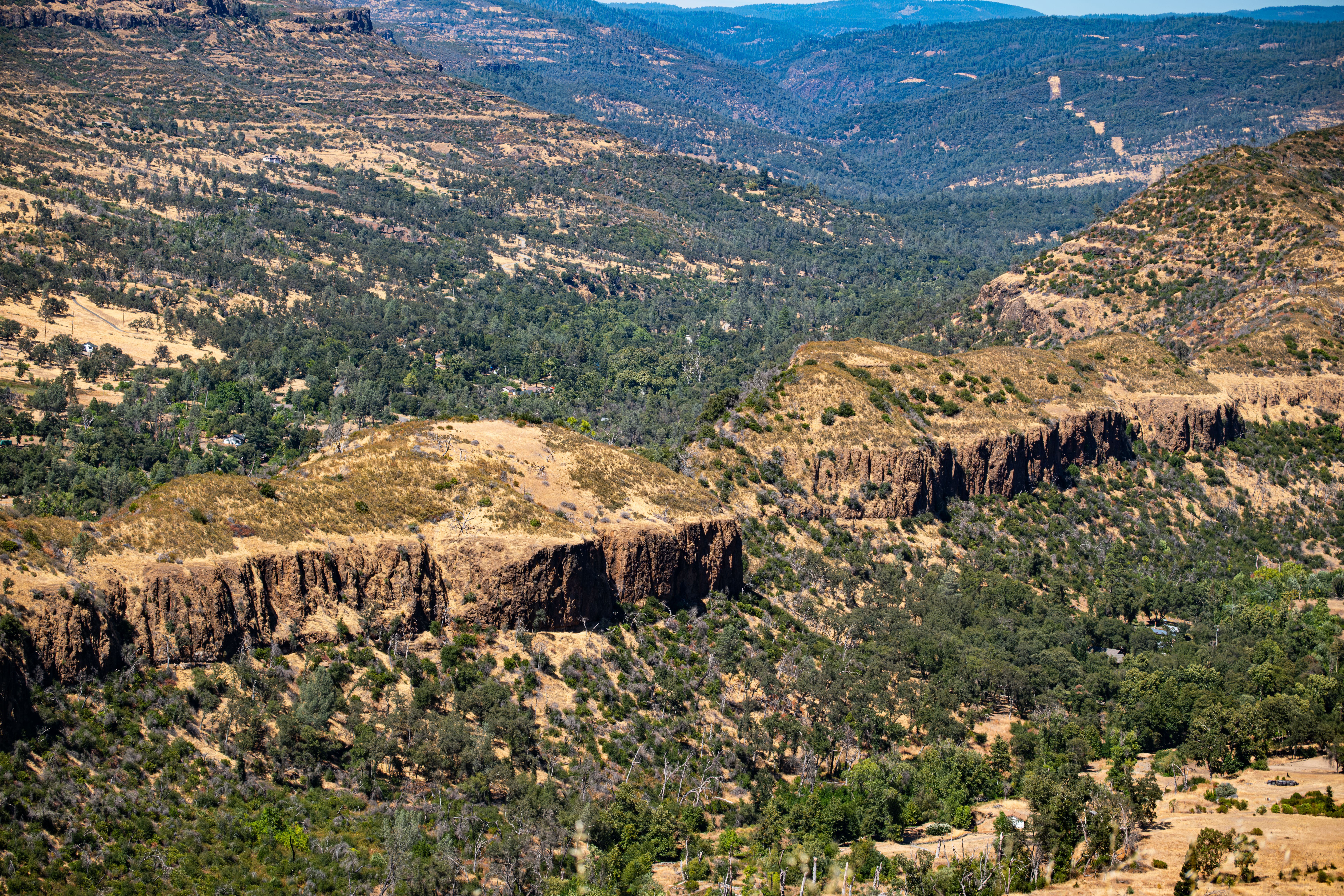 Stunning landscape shot of Bidwell Park's canyon terrain in Chico, California, showcasing geological formations and lush vegetation.