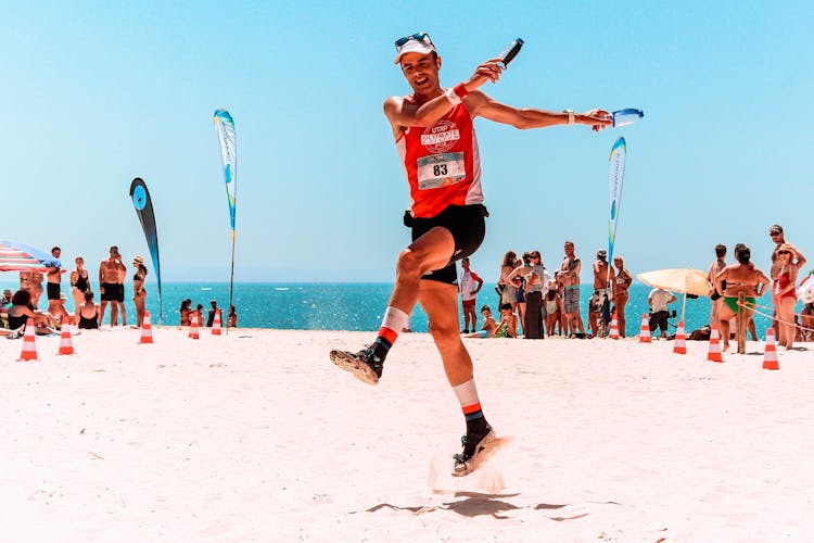 Photo Of Man Jumping On The Beach