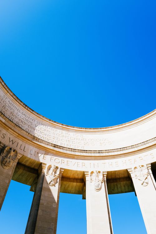 Free Majestic circular stone structure with detailed carvings under a clear blue sky, showcasing historical architecture. Stock Photo
