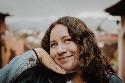 A woman smiling and posing for a portrait