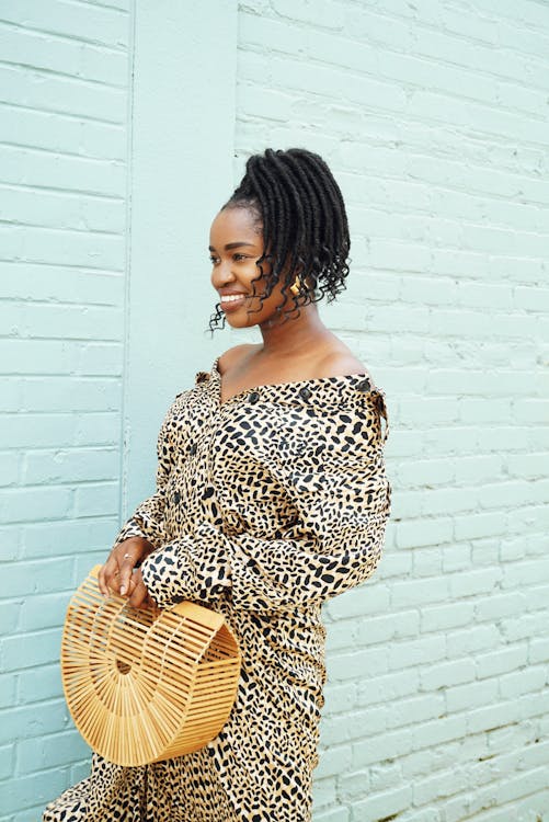 Free Photo of Woman Smiling While Wearing Dress Stock Photo