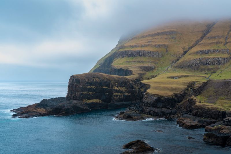 Rugged coastal cliffs by Raul Ling on Pexels