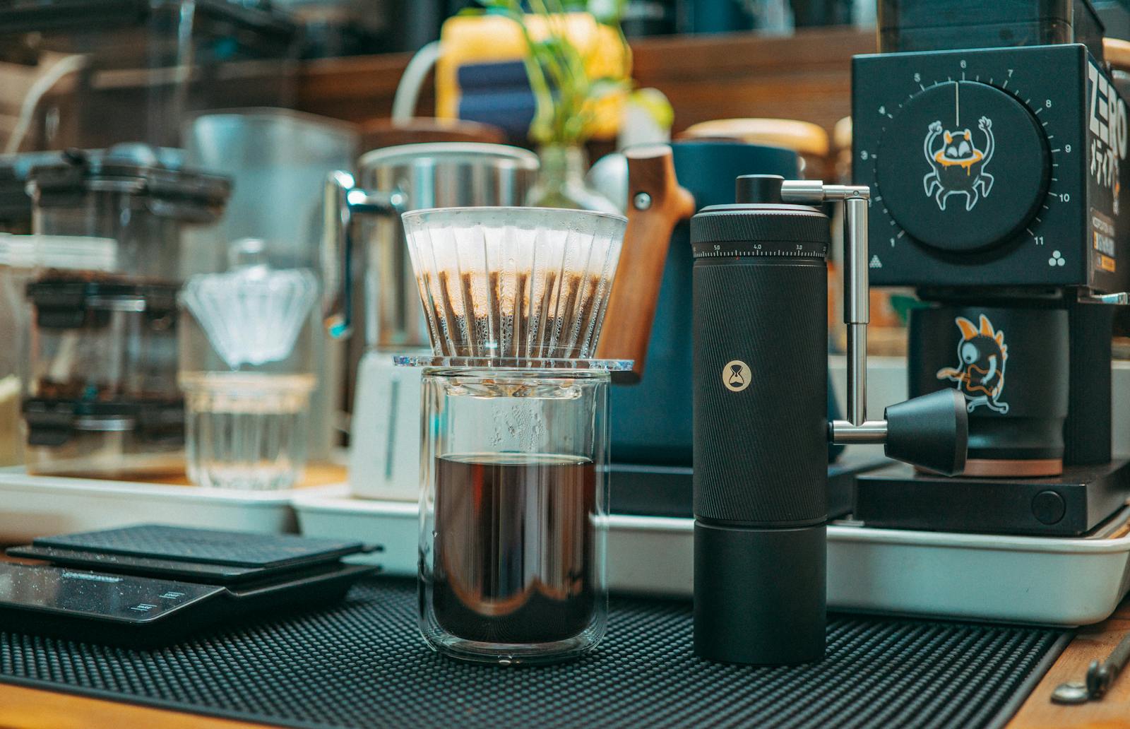 Modern drip coffee setup with grinder, filter, and scale